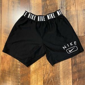 Girls Nike Dri-FIT training shorts.